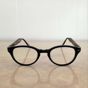 John Varvatos unisex eyeglass frames. Black front, brown tortoiseshell sides.
